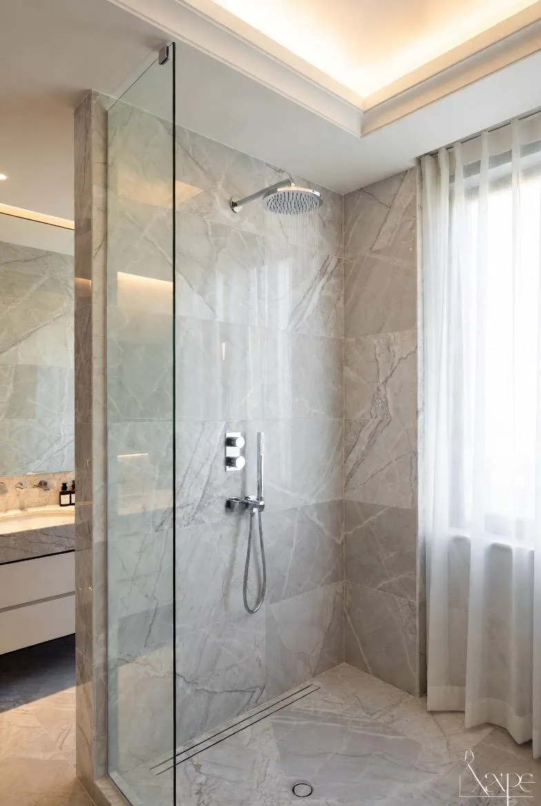 Fixed toughened shower glass panel installation India
